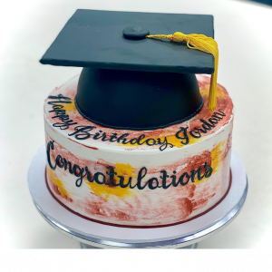 watercolor cake with fondant grad cap